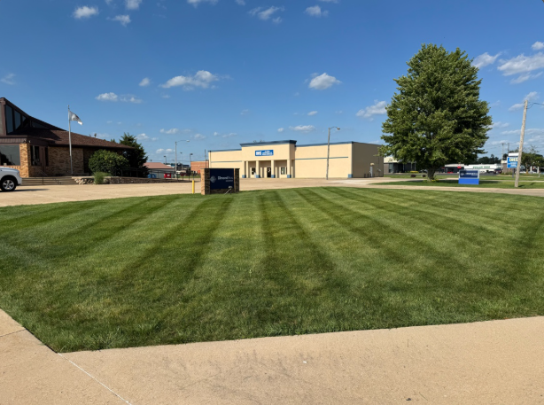 Professional mowing stripes on commercial lawn by BDS Lawns